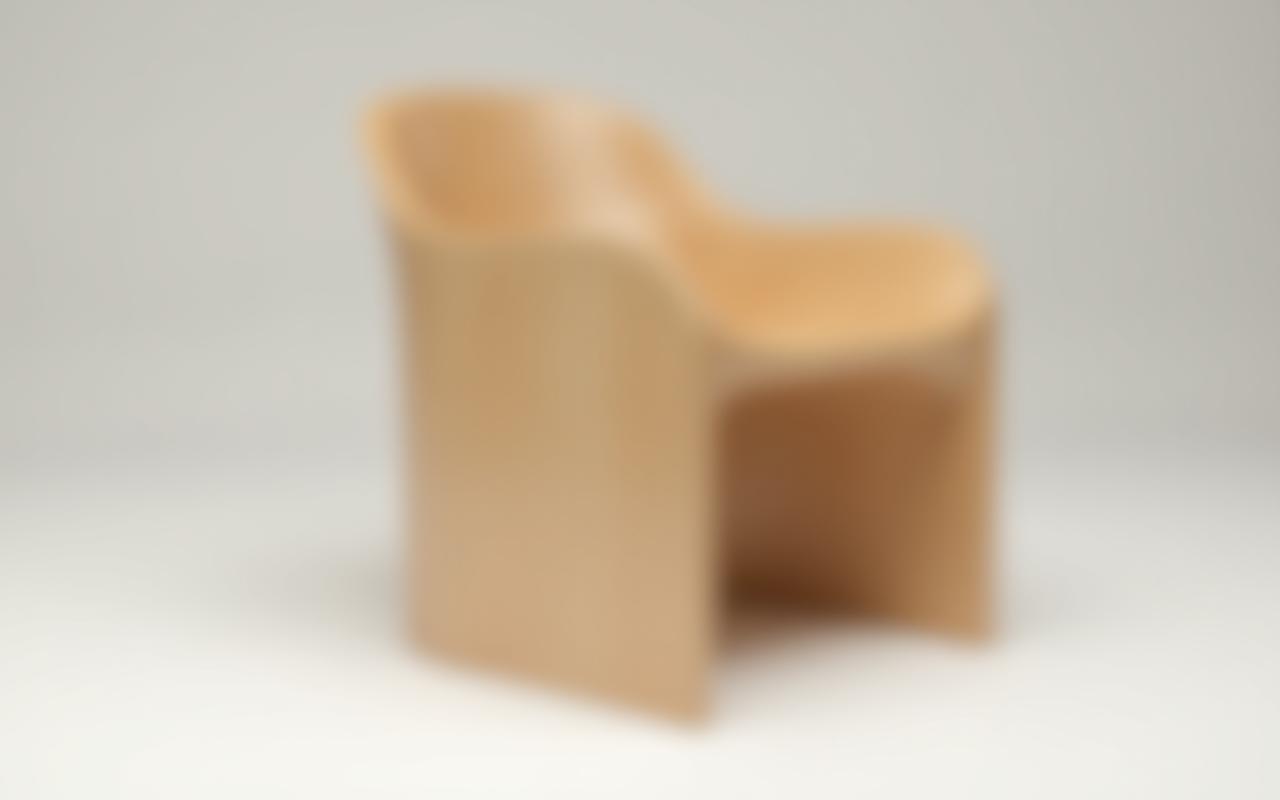 Modern minimalist chair crafted from sturdy zelkova wood, highlighting its ergonomic design and smooth finish.